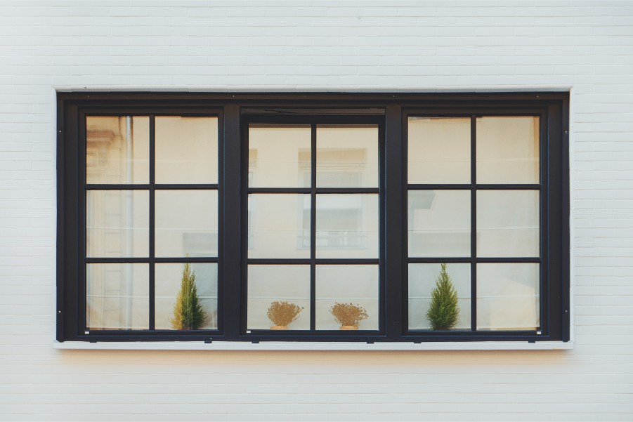 8 Sophisticated Exterior House Colors with Black Windows - Paintzen