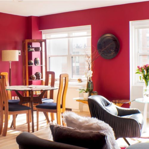 Red Livingroom in a Bright Apartment