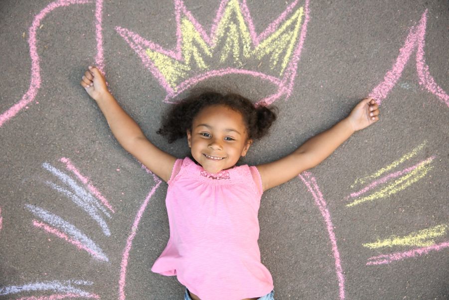 little girl sidewalk chalk